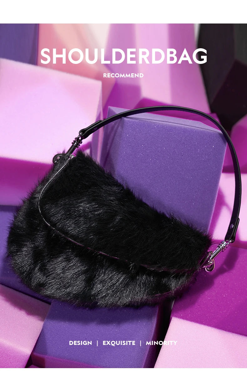 Black furry shoulder bag on a purple geometric background