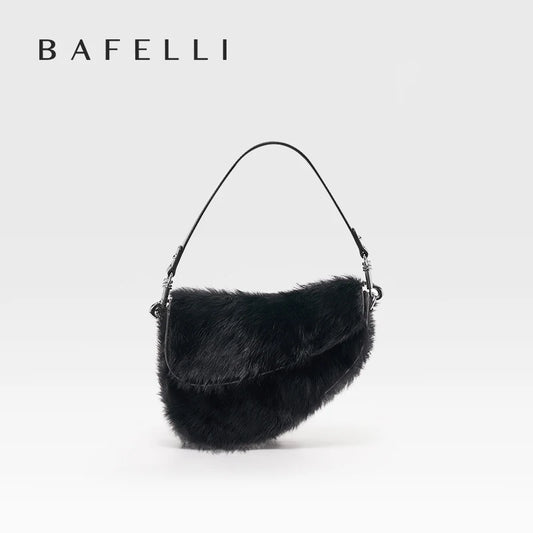 Black fur handbag with a strap on a white background